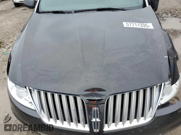 2010 Lincoln MKS z VIN 1LNHL9DR5AG601996, wystawiony jako Copart lot #57711335 z przebiegiem Nie podano mil oraz Szkoda całkowita • Salvage title. Historia ofert i sprzedaży dostępna na DreamBid. Obrazek 11.