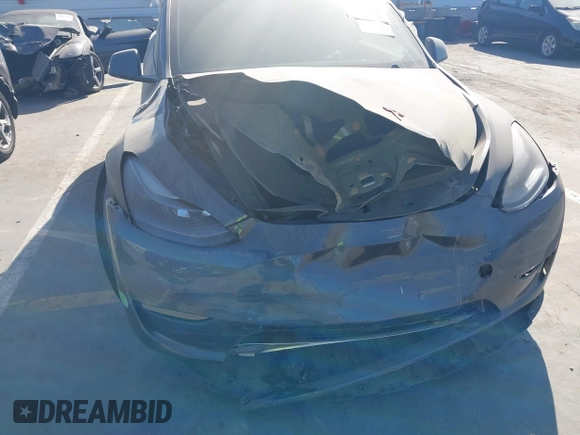 2023 Tesla Model Y Performance with VIN 7SAYGDEF0PF774282, listed as a IAAI auction lot 41807031 with Not Provided miles and . Bid and sale history available at DreamBid. Image 6.