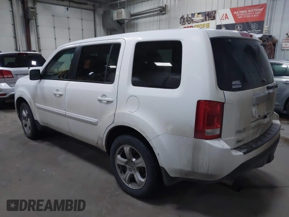 2015 Honda Pilot EX-L with VIN 5FNYF4H59FB023814, listed as a IAAI auction lot 41161235 with 216,437 mi miles and . Bid and sale history available at carsss.com. Image 3.