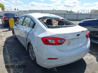 2017 Chevrolet Cruze LT with VIN 1G1BE5SM0H7211492, listed as a IAAI auction lot 41820508 with 153,340 mi miles and . Bid and sale history available at DreamBid. Image 3.