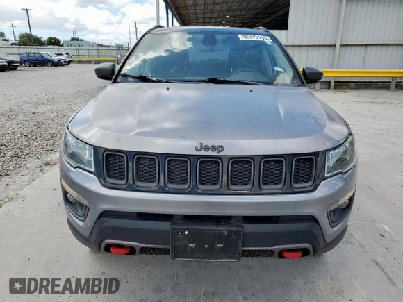 2020 Jeep Compass Trailhawk z VIN 3C4NJDDB6LT202919, wystawiony jako Copart lot #66373195 z przebiegiem 122 039 mil mil oraz Czysty tytuł • Clean title. Historia ofert i sprzedaży dostępna na DreamBid. Obrazek 5.