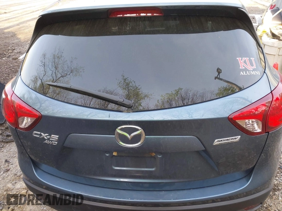 2016 Mazda CX-5 Touring with VIN JM3KE4CY5G0771252, listed as a IAAI auction lot 42138637 with 106,767 mi miles and . Bid and sale history available at carsss.com. Image 16.