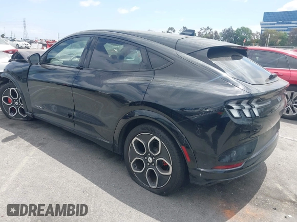 2023 Ford Mustang Mach-E GT z VIN 3FMTK4SE1PMA44650, wystawiony jako IAAI lot #42127300 z przebiegiem 7121 mil mil oraz . Historia ofert i sprzedaży dostępna na DreamBid. Obrazek 3.