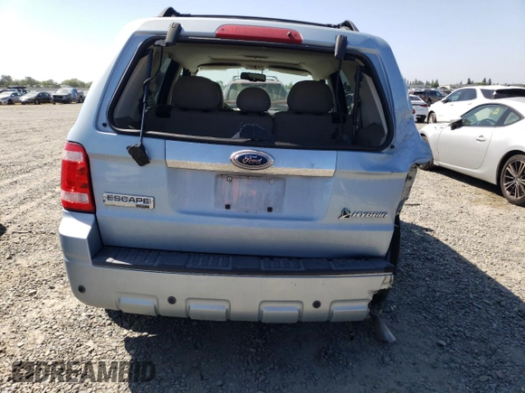 2009 Ford Escape Hybrid z VIN 1FMCU49309KA30344, wystawiony jako Copart lot #55644835 z przebiegiem 112 641 mil mil oraz Szkoda całkowita • Salvage title. Historia ofert i sprzedaży dostępna na DreamBid. Obrazek 6.