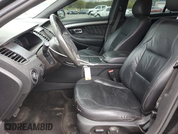 2015 Ford Taurus SEL with VIN 1FAHP2E92FG168293, listed as a Copart auction lot 52775625 with 207,447 mi miles and Salvage title. Bid and sale history available at DreamBid. Image 7.