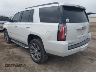 2019 GMC Yukon SLT with VIN 1GKS1BKCXKR329607, listed as a IAAI auction lot 41188239 with 84,940 mi miles. Bid and sale history available at carsss.com. Image 3.