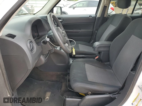 2013 Jeep Patriot Sport with VIN 1C4NJPBA1DD264473, listed as a Copart auction lot 59222735 with 165,206 mi miles and Salvage title. Bid and sale history available at DreamBid. Image 7.