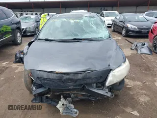2010 Toyota Corolla z VIN 1NXBU4EE7AZ313190, wystawiony jako IAAI lot #42071393 z przebiegiem Nie podano mil oraz . Historia ofert i sprzedaży dostępna na DreamBid. Obrazek 11.