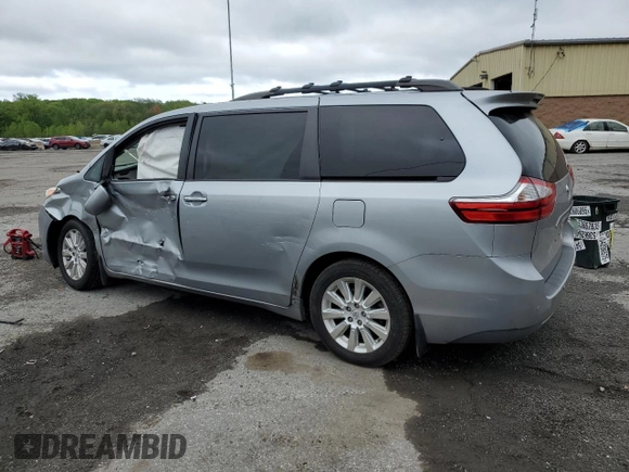 2015 Toyota Sienna Limited with VIN 5TDDK3DC5FS118715, listed as a Copart auction lot 55957215 with 133,500 mi miles and Salvage title. Bid and sale history available at DreamBid. Image 2.