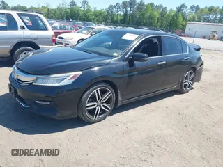 2016 Honda Accord Touring with VIN 1HGCR3F93GA036152, listed as a IAAI auction lot 42134354 with 233,311 mi miles and . Bid and sale history available at DreamBid. Image 17.