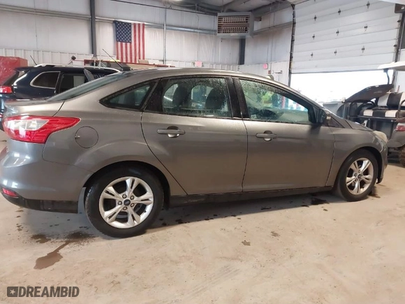 2014 Ford Focus SE with VIN 1FADP3F27EL153901, listed as a IAAI auction lot 41724290 with 141,036 mi miles. Bid and sale history available at carsss.com. Image 13.