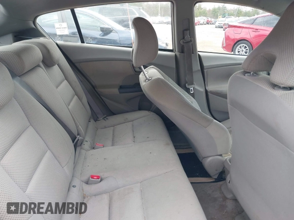 2010 Honda Insight LX with VIN JHMZE2H58AS014396, listed as a IAAI auction lot 42097224 with 167,505 mi miles and . Bid and sale history available at DreamBid. Image 8.