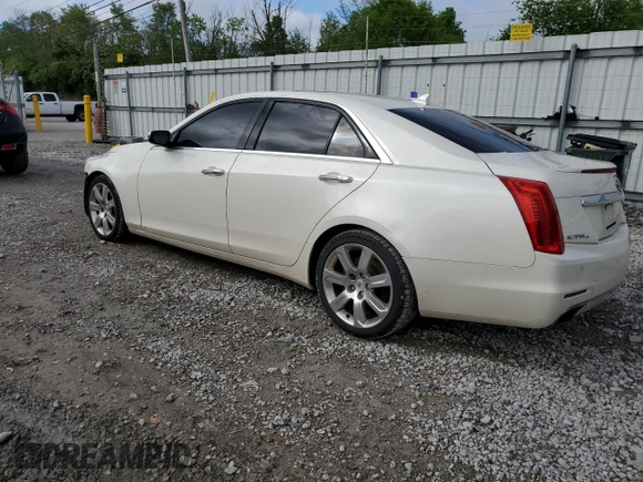 2014 Cadillac CTS Premium AWD with VIN 1G6AZ5S35E0156897, listed as a Copart auction lot 55838595 with 124,999 mi miles and Salvage title. Bid and sale history available at DreamBid. Image 2.