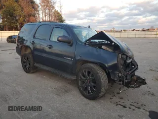 2007 GMC Yukon SLE with VIN 1GKFK13057J390012, listed as a Copart auction lot 86693004 with 0 mi miles and Salvage Title. Bid and sale history available at carsss.com. Image 4.