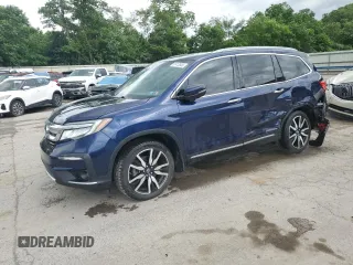 2021 Honda Pilot Touring 8-Passenger with VIN 5FNYF6H93MB014795, listed as a Copart auction lot 61413505 with 114,726 mi miles and Salvage title. Bid and sale history available at DreamBid. Image 1.