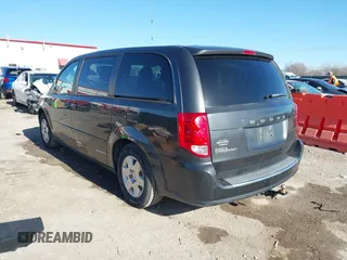 2011 Dodge Grand Caravan SXT with VIN 2D4RN4DGXBR765249, listed as a IAAI auction lot 41097760 with 95,481 mi miles and . Bid and sale history available at DreamBid. Image 3.