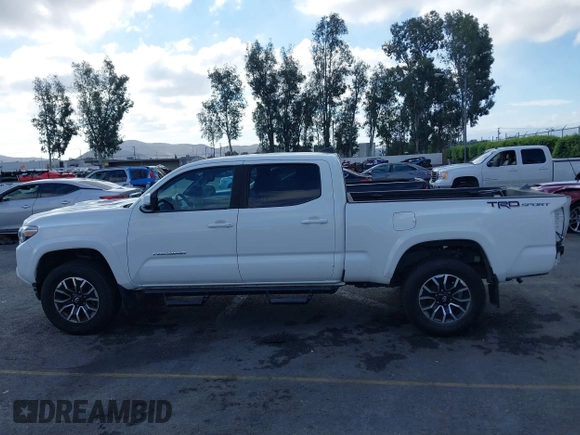 2020 Toyota Tacoma SR5 with VIN 3TMBZ5DN7LM026596, listed as a IAAI auction lot 40705410 with 123,489 mi miles and . Bid and sale history available at DreamBid. Image 15.