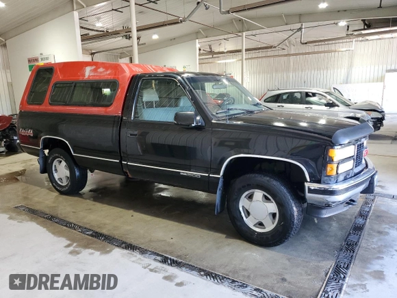 1996 GMC Sierra 1500 with VIN 1GTEK14M9TZ546010, listed as a Copart auction lot 54353635 with 252,481 mi miles and Salvage Title. Bid and sale history available at DreamBid. Image 4.