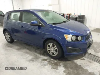 2013 Chevrolet Sonic LT with VIN 1G1JC6SB9D4252785, listed as a IAAI auction lot 41499502 with 114,924 mi miles. Bid and sale history available at carsss.com. Image 1.
