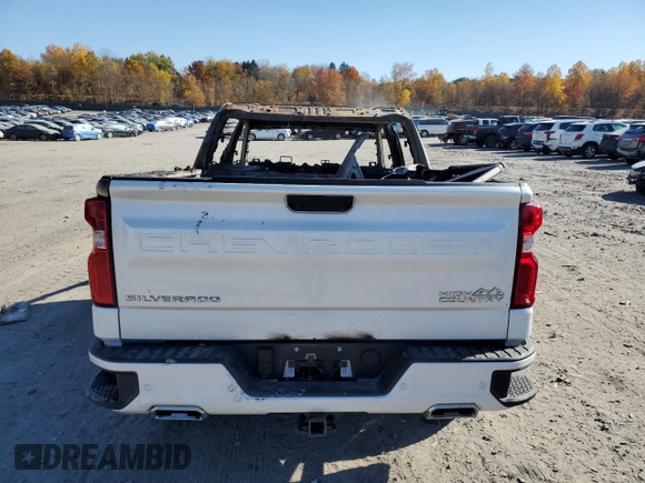 2024 Chevrolet Silverado 1500 High Country with VIN 1GCUDJE81RZ171567, listed as a Copart auction lot 77523084 with Not Provided miles and Salvage Title. Bid and sale history available at DreamBid. Image 6.