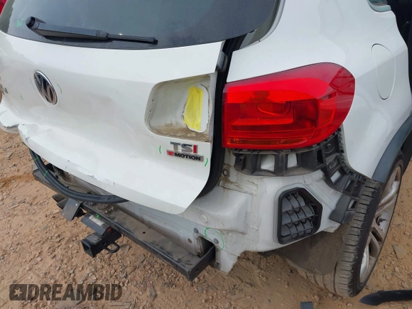 2016 Volkswagen Tiguan S with VIN WVGBV7AXXGW585445, listed as a IAAI auction lot 42083377 with 111,011 mi miles and . Bid and sale history available at DreamBid. Image 6.
