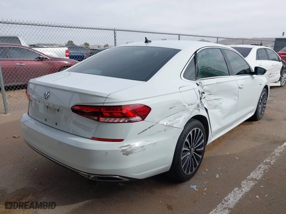 2022 Volkswagen Passat 2.0T Limited Edition with VIN 1VWBA7A32NC006523, listed as a IAAI auction lot 41263642 with 52,578 mi miles. Bid and sale history available at carsss.com. Image 4.