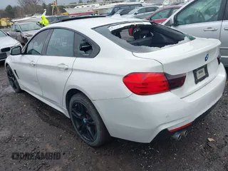 2016 BMW 4 Series 428i xDrive with VIN WBA4C9C57GG141554, listed as a IAAI auction lot 41988753 with Not Provided miles. Bid and sale history available at carsss.com. Image 3.