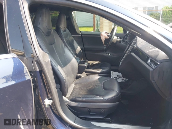 2014 Tesla Model S 60 with VIN 5YJSA1H17EFP65983, listed as a IAAI auction lot 42399288 with 166,365 mi miles and . Bid and sale history available at DreamBid. Image 5.