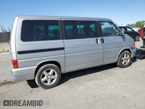 2002 Volkswagen EuroVan с VIN WV2KB47012H065431, выставлен на аукционе Copart как лот 49010445 с пробегом 78 985 миль миль и Чистый • Clean title. История ставок и продаж доступна на DreamBid. Изображение 3.
