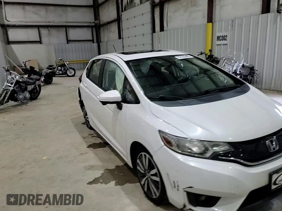 2017 Honda Fit EX with VIN JHMGK5H77HS003015, listed as a Copart auction lot 57205495 with 112,481 mi miles and Salvage title. Bid and sale history available at DreamBid. Image 13.
