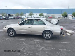 1997 Toyota Camry LE z VIN 4T1BF22K8VU916373, wystawiony jako IAAI lot #41915751 z przebiegiem 259 818 mil mil oraz . Historia ofert i sprzedaży dostępna na DreamBid. Obrazek 13.