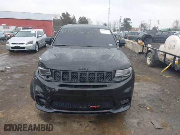 2018 Jeep Grand Cherokee SRT z VIN 1C4RJFDJ2JC391503, wystawiony jako IAAI lot #41717243 z przebiegiem 78 157 mil mil oraz . Historia ofert i sprzedaży dostępna na DreamBid. Obrazek 12.
