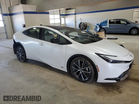 2023 Toyota Prius LE with VIN JTDADABU2P3000654, listed as a Copart auction lot 51953505 with 27,946 mi miles and Salvage Title. Bid and sale history available at DreamBid. Image 4.