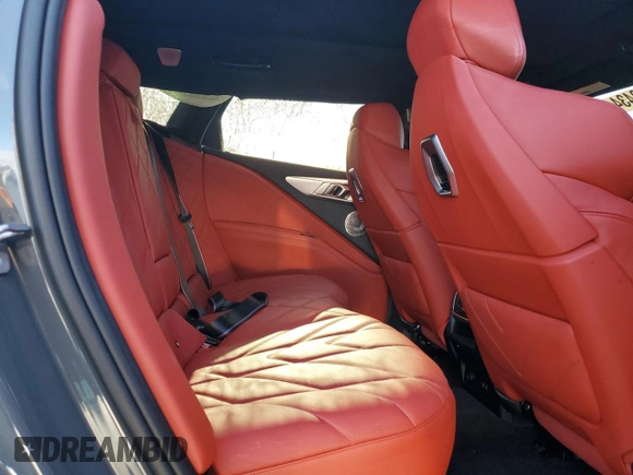 2024 BMW XM z VIN 5YM23CS00R9V38387, wystawiony jako Copart lot #86828434 z przebiegiem Nie podano mil oraz Szkody całkowita. Historia ofert i sprzedaży dostępna na DreamBid. Obrazek 12.