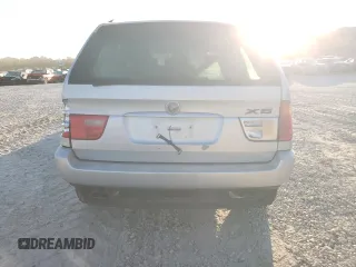 2000 BMW X5 4.4i with VIN WBAFB3355YLH05755, listed as a Copart auction lot 77136744 with 0 mi miles and Salvage Title. Bid and sale history available at carsss.com. Image 6.