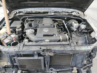 2015 Nissan Frontier SV z VIN 1N6AD0FRXFN722101, wystawiony jako Copart lot #76144314 z przebiegiem 87 902 mil mil oraz Szkoda całkowita • Salvage title. Historia ofert i sprzedaży dostępna na DreamBid. Obrazek 11.