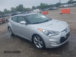 2012 Hyundai Veloster w/Black Int z VIN KMHTC6AD1CU034787, wystawiony jako IAAI lot #42607847 z przebiegiem 126 912 mil mil oraz . Historia ofert i sprzedaży dostępna na DreamBid. Obrazek 1.