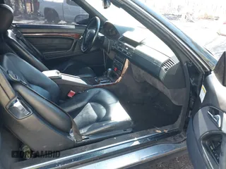 1999 Mercedes-Benz SL-Class with VIN WDBFA68F9XF187036, listed as a IAAI auction lot 41542221 with 114,602 mi miles. Bid and sale history available at carsss.com. Image 5.