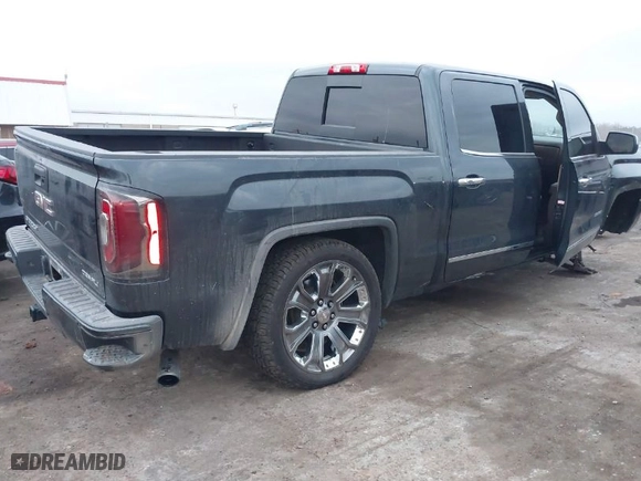 2018 GMC Sierra 1500 Denali with VIN 3GTU2PEJ8JG571593, listed as a IAAI auction lot 41169420 with 98,501 mi miles. Bid and sale history available at carsss.com. Image 4.