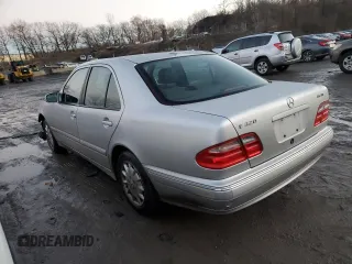 2002 Mercedes-Benz E-Class with VIN WDBJF82J32X066803, listed as a Copart auction lot 85474614 with 77,358 mi miles and Salvage Title. Bid and sale history available at carsss.com. Image 2.