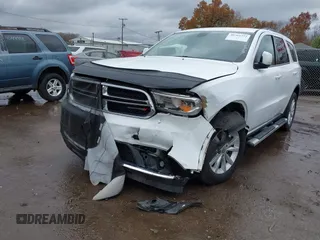 2015 Dodge Durango SXT with VIN 1C4RDJAG8FC239977, listed as a IAAI auction lot 40764725 with 133,809 mi miles and . Bid and sale history available at carsss.com. Image 6.
