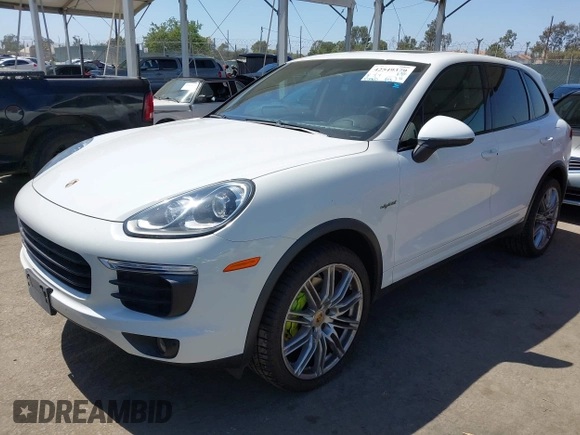 2016 Porsche Cayenne S E-Hybrid with VIN WP1AE2A25GLA63734, listed as a IAAI auction lot 42549379 with 155,065 mi miles and . Bid and sale history available at DreamBid. Image 2.