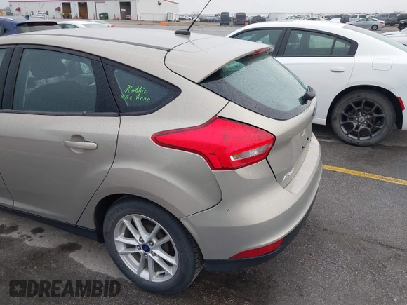 2015 Ford Focus SE with VIN 1FADP3K21FL211511, listed as a IAAI auction lot 42153828 with 126,111 mi miles. Bid and sale history available at carsss.com. Image 6.