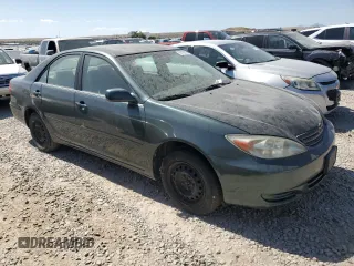 2002 Toyota Camry LE z VIN JTDBE32K120068644, wystawiony jako Copart lot #61168915 z przebiegiem 210 149 mil mil oraz Czysty tytuł • Clean title. Historia ofert i sprzedaży dostępna na DreamBid. Obrazek 4.