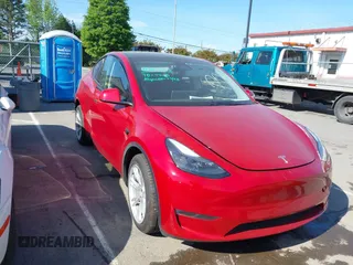 2023 Tesla Model Y Long Range z VIN 7SAYGDEEXPA182702, wystawiony jako IAAI lot #42023730 z przebiegiem Nie podano mil oraz . Historia ofert i sprzedaży dostępna na DreamBid. Obrazek 1.