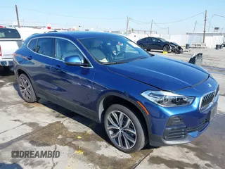 2022 BMW X2 xDrive28i z VIN WBXYJ1C02N5U85241, wystawiony jako IAAI lot #41965012 z przebiegiem 36 262 mil mil oraz . Historia ofert i sprzedaży dostępna na DreamBid. Obrazek 1.