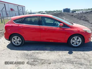 2012 Ford Focus SEL with VIN 1FAHP3M22CL213780, listed as a IAAI auction lot 42071129 with 151,924 mi miles. Bid and sale history available at carsss.com. Image 16.
