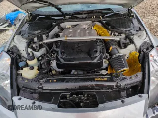 2004 Nissan 350Z Enthusiast z VIN JN1AZ34D54T152775, wystawiony jako Copart lot #56900385 z przebiegiem 182 564 mil mil oraz Szkoda całkowita • Salvage title. Historia ofert i sprzedaży dostępna na DreamBid. Obrazek 11.