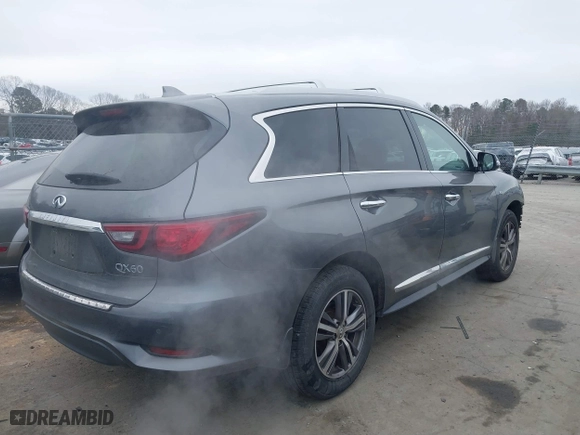 2019 Infiniti QX60 PURE with VIN 5N1DL0MM8KC569052, listed as a IAAI auction lot 41172254 with 85,993 mi miles. Bid and sale history available at carsss.com. Image 4.