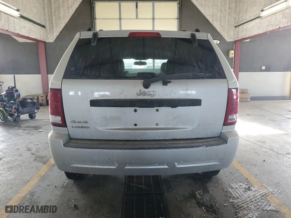 2007 Jeep Grand Cherokee Laredo with VIN 1J8GR48K67C652382, listed as a Copart auction lot 45310295 with 266,618 mi miles and Salvage Title. Bid and sale history available at carsss.com. Image 6.